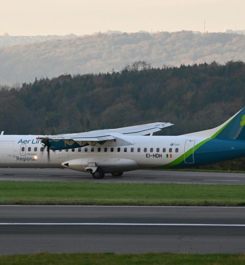 Aer Lingus ATR 72 ready for takeoff at Bristol Airport during daytime.